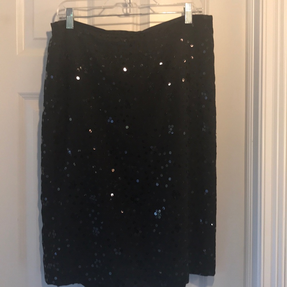 Sequence black knee length skirt.